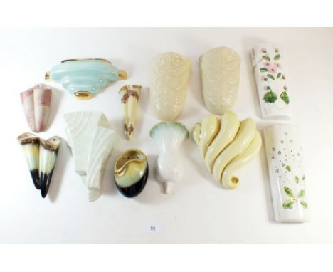 A collection of vintage ceramic wall pockets