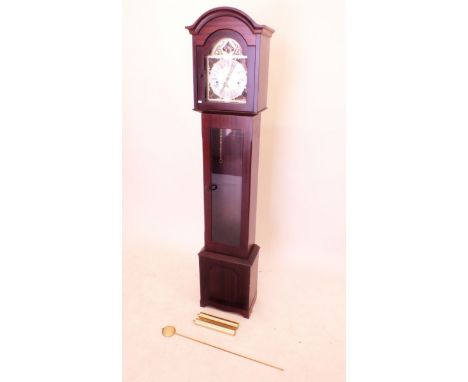 A reproduction longcase clock with eight day movement