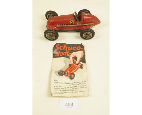 A Schuco Studio driving school car with leaflet, No 1050