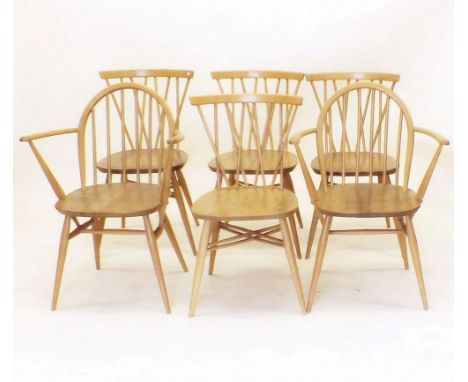 A set of four Ercol lattice back 'Candlestick' light elm dining chairs and two carvers