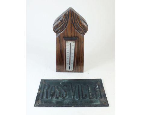 An oak Arts and Crafts carved thermometer and an Arts and Crafts copper door plaque 'Ross Villa'