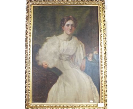 An early 20th century oil on canvas portrait of a lady 'Eleanor S Wood' dated 1919, 60 x 39.5cm