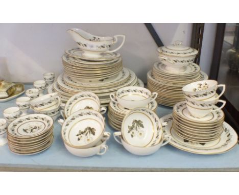 An Royal Worcester Bernina tea and dinner service comprising:- seven soup bowls and stands, four teacups and saucers, six egg