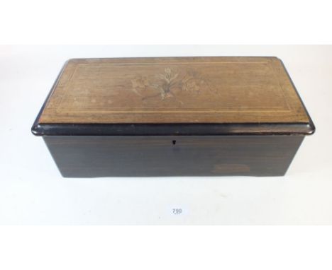 A 19th century Swiss cylinder musical box playing eight tunes, with floral marquetry inlay to lid 43cm wide