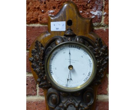 A VICTORIAN CAST IRON CASED WALL CLOCK/BAROMETER THERMOMETER ON OAK BACKBOARD SIGNED J J WAINWRIGHT & Co, BIRMINGHAM.   H.70c