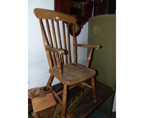 A VICTORIAN STICK BACK WINDSOR ARMCHAIR.