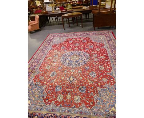 A PERSIAN ROOMSIZE CARPET OF CLASSIC DESIGN. 405 x 305 cm