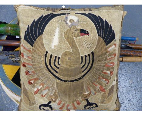 AN ANTIQUE EGYPTIAN TEXTILE DEPICTING NEKHBET. NOW MOUNTED AS A CUSHION COVER. TOGETHER WITH TWO EASTERN FANS, TWO PARASOLS A