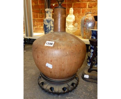 AN UNUSUAL ORIENTAL POTTERY BOTTLE FORM VASE WITH FAUX GOURD GLAZE MOUNTED AS A LAMP ON HARDWOOD BASE.   OVERALL H.45cms  TOG
