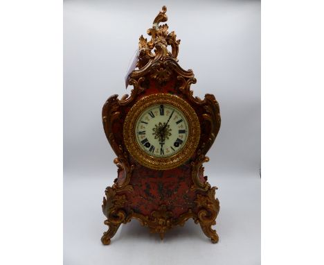 A LATE 19th.C.FRENCH STYLE FAUX TORTOISESHELL BOULLE WORK MANTLE CLOCK WITH ROCOCO METAL FITTINGS.   H.43cms.