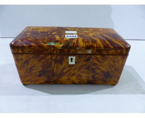 A LATE REGENCY BLOND TORTOISESHELL TEA CADDY WITH DOME TOP FORM LID ENCLOSING FITTED INTERIOR.   W.30cms.