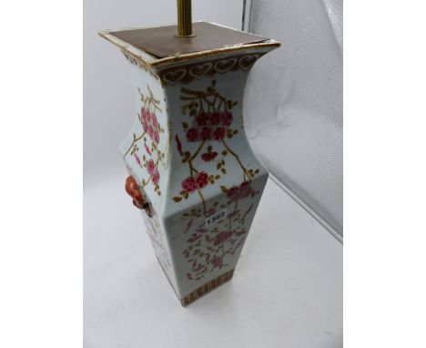 A CHINESE FAMILLE ROSE SQUARE FORM VASE WITH MASK HANDLES NOW MOUNTED AS A LAMP.   OVERALL H.50cms.