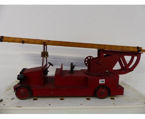 A SCRATCH BUILT MODEL OF A FIRE ENGINE.