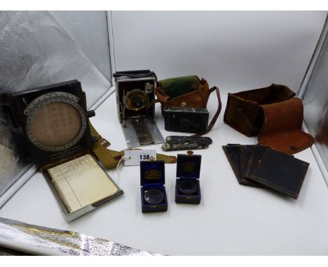 AN AIR MINISTRY DALTON DEAD RECKONING COMPUTER MODEL G TOGETHER WITH AN ALLOY CASED CAMERA AND OTHER ITEMS.