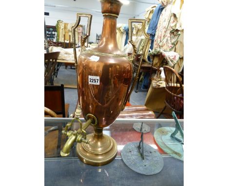 A VICTORIAN COPPER TWIN HANDLE URN MOUNTED AS A LAMP.   OVERALL H.59cms.