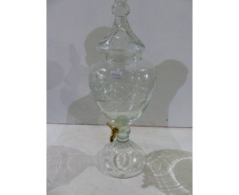 A CUT GLASS URN FORM FOUNTAIN OR CISTERN AND THE COVER WITH SPIKE FINIAL.   H.65cms.