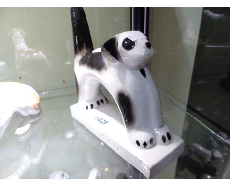 AN ART DECO MODEL OF A DOG STAMPED GEO CONDE.    H.20cms.   L.20cms.