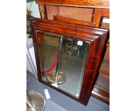 AN 18th.C.WALNUT CUSHION FRAMED WALL MIRROR.   W.65 x H.79cms.