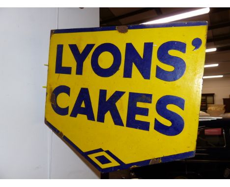 A DOUBLE SIDED ENAMEL ADVERTISING SIGN FOR LYONS CAKE AND ANOTHER FOR ALADDIN PINK PARAFFIN.  (2)