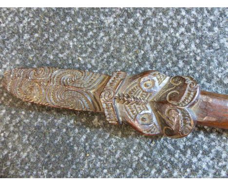 A NEW ZEALAND MAORI LONG CLUB, TAIAMA WITH CARVED FINIAL AND LONG TAPERED SHAFT.   L.153cms   W. (AT BROADEST POINT) 5.5cms.