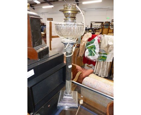 A LATE VICTORIAN WALKER & HALL SILVER PLATE CORINTHIAN COLUMN OIL LAMP WITH CUT GLASS FONT, ELECTRIFIED.   OVERALL H.64cms.