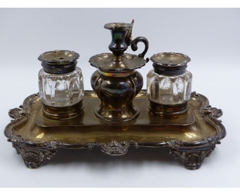 A VICTORIAN TWO BOTTLE INKSTAND WITH A CENTRAL TAPER STICK INCLUDING SNUFFER. DATED LONDON 1858. APPROXIMATE MEASUREMENTS 28c