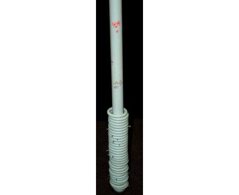 A light blue painted and floral sprig decorated 275cm pine curtain pole with thirty rings