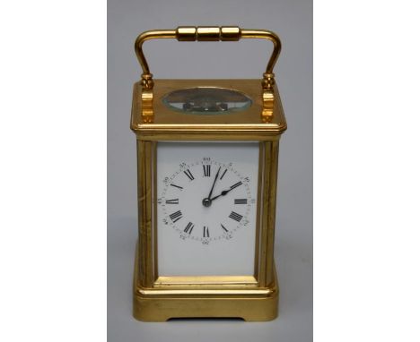 An early 20th century French brass, five glass carriage clock, the eight day movement faced by enamel Roman dial, 17cm (handl