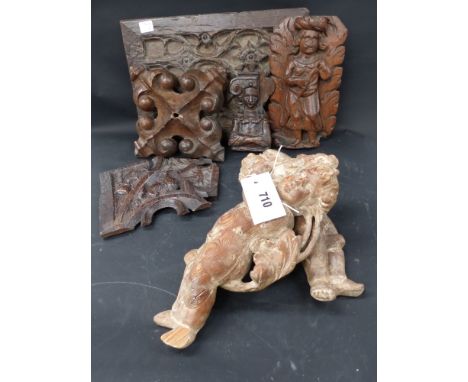 A group of carved architectural and furniture elements to include a tracery panel, a pair of Putti, etc