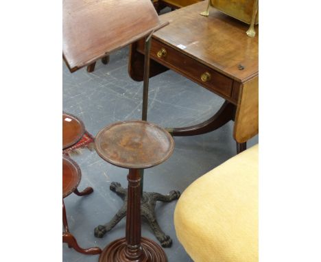 A Victorian Carter's patent adjustable reading stand together with a turned carved mahogany lamp table