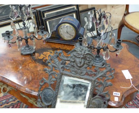 A pair of French table lustres hung with prisms, a Bronze mirror back three light sconce, and a  chinoiserie decorated clock