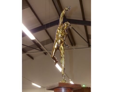 An Antique bronze of Mercury mounted on an oak column pedestal