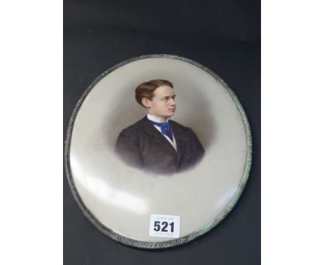An Antique Berlin K.P.M porcelain oval plaque. Portrait of a young gentleman. Brass mount