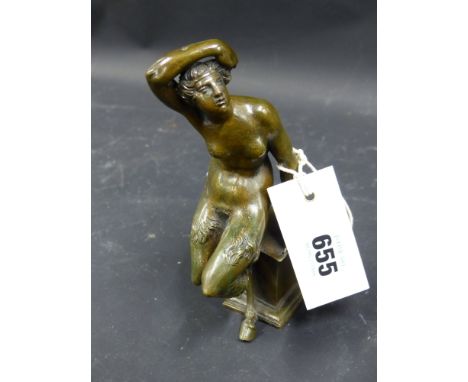 An Antique Italiante bronze of a seated female satyr