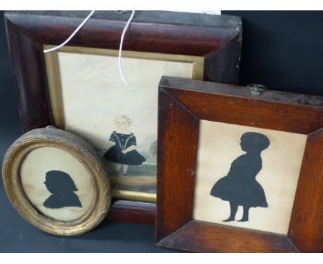 A 19th Century naive miniature watercolour portrait of a child with a pull toy together with two silhouette portraits