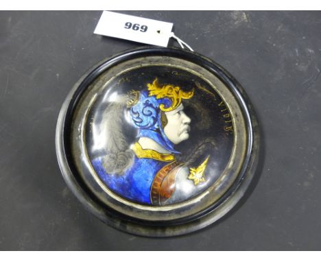 An Antique enamel circular plaque decorated with a bust portrait of a warrior, possibly Limoges