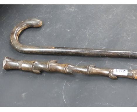 A 19th.c.sectional form walking cane together with a horn handled walking stick