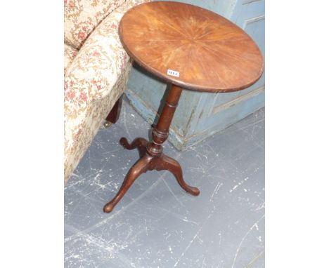 Two Georgian mahogany tripod tables of similar design