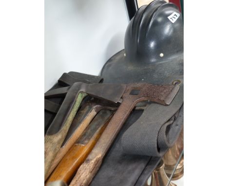 An American fireman's helmet together with four fire axes of WW II Period, a pair of protective trousers, a Ceag copper miner
