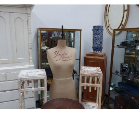 A vintage dress makers dummy or mannequin by Yugin & sons together with a pair of painted display stands