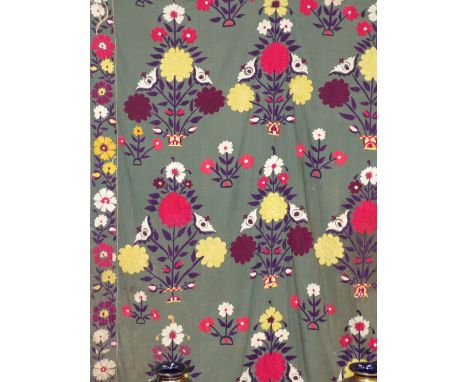 A Suzani needlework panel, floral sprays on a sage green field