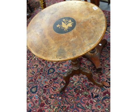 A Victorian walnut and inlaid tripod table