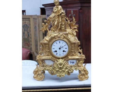 A gilt bronze and marble inset mantle clock with striking movement signed Henri Marc, Paris