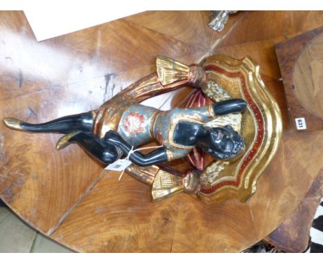 An Antique carved and decorated blackamoor wall bracket
