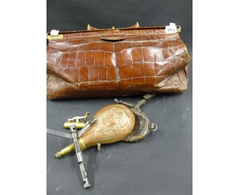 Two Military combination tools. A copper powder flask etc and a leather Gladstone bag
