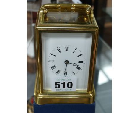 A small brass cased carriage clock