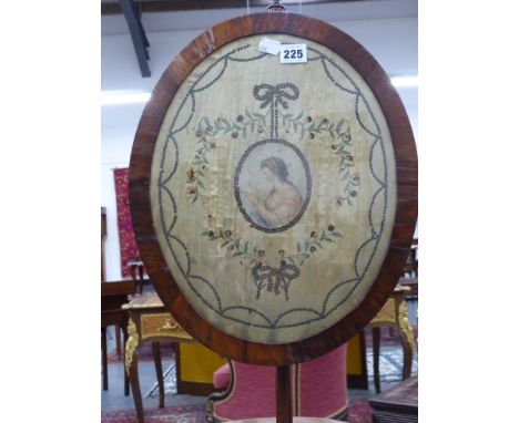 A Wm.IV.mahogany pole screen with silk embroidered oval panel