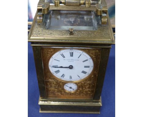 A large Victorian engraved glass cased carriage clock with strike repeat, the dial signed Ollivant & Dotsford, Paris
