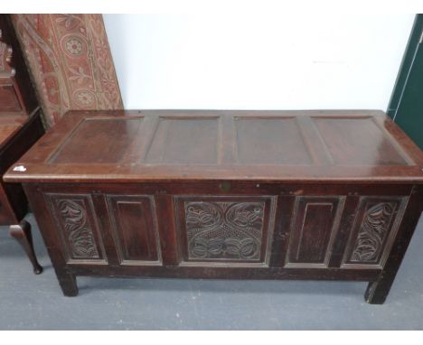 An 18th.C. Oak coffer with unusual five panel front