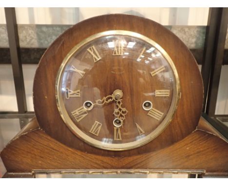 Walnut cased Westminster chime mantel clock with pendulum 